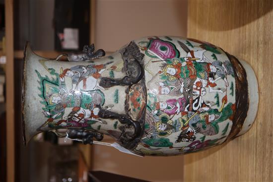 A Cantonese two handled vase, painted with warriors H.35cm